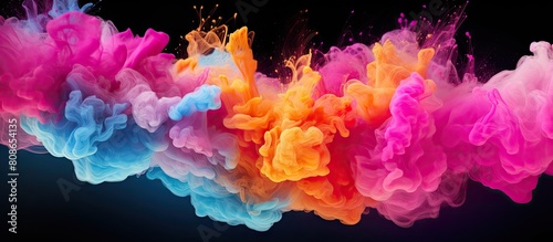 Multicolored powder cloud with an abstract design against a white background provides ample copy space for images
