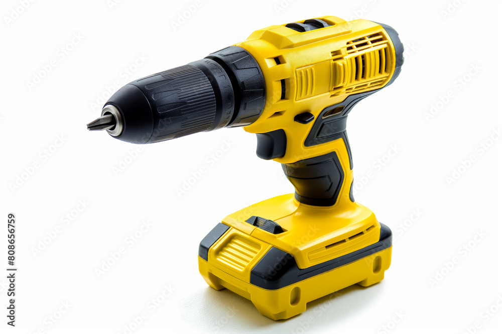 A modern yellow and black cordless electric drill isolated on a white background, symbolizing DIY and construction