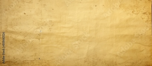 An aged piece of paper with a yellowed appearance showing signs of crumpling and spots copy space image