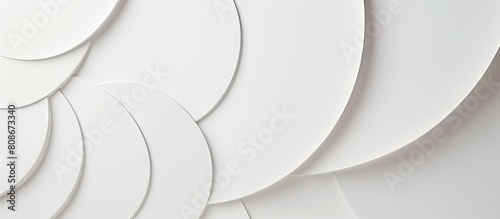 An elegant modern and minimal white geometric backdrop with soft light circles and semicircle stepped surfaces creating an abstract and stylish composition This top view image provides ample copy spa photo