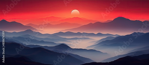 Mountains illuminated by a striking red sunset with fog enveloping the terrain. Copy space image. Place for adding text and design photo