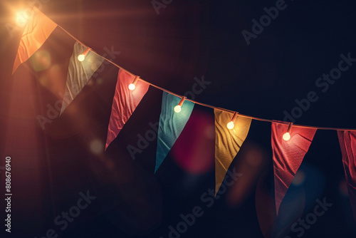a string of flags with lights photo