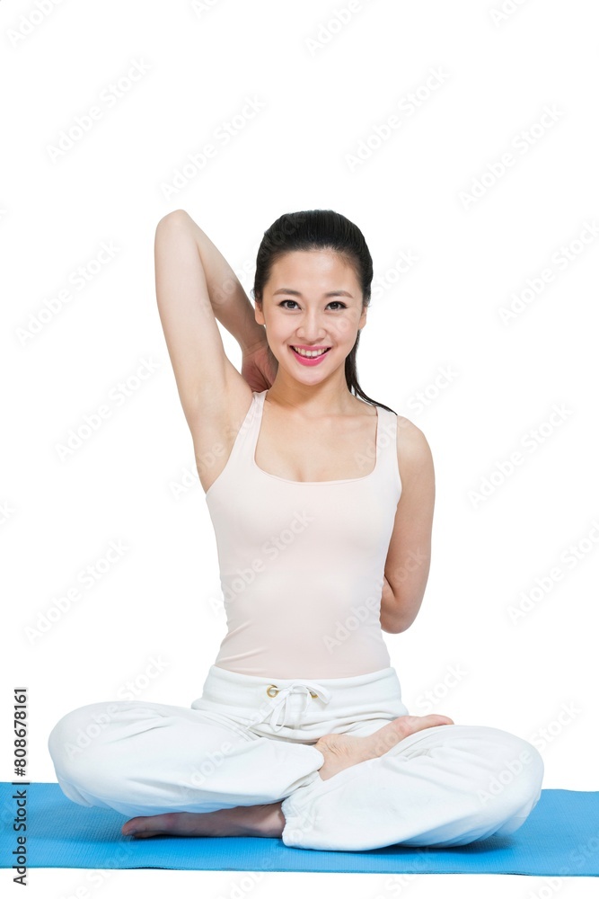 Shed young woman doing yoga