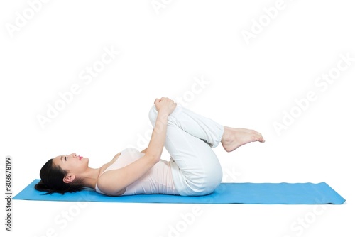 Shed young woman doing yoga