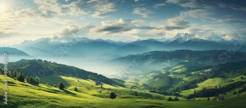 The rolling landscape of the Alpine foothills provides a picturesque scenery with abundant natural beauty offering a perfect copy space image photo