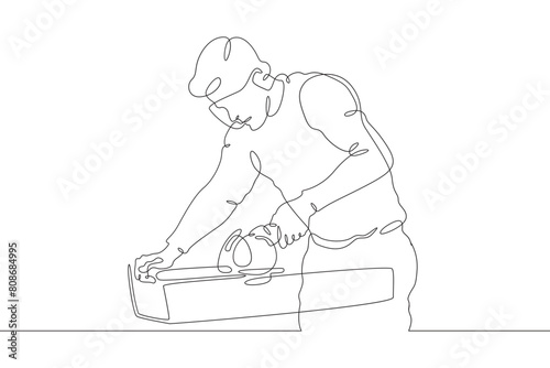 A joiner at work. A carpenter works with a tool on wood. Woodworking. Wood carver. One continuous line. Line art. Minimum one line. White background. One line drawing.