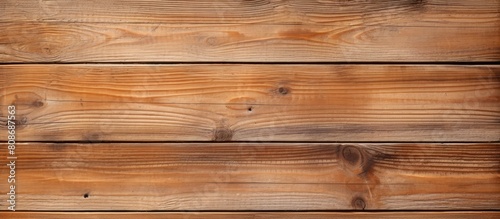 Top view of wooden boards with a natural color and texture perfect for use as a background in images needing copy space