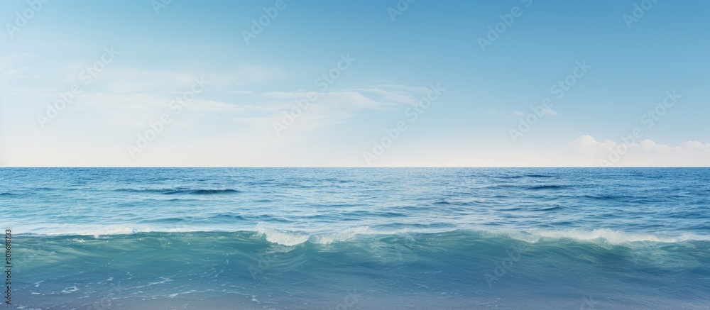 A serene seascape with gentle waves lapping at the water s edge offering a calming copy space image