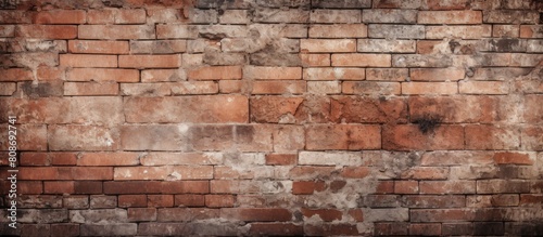 The background showcases a textured aged brick wall with ample room for adding images or text