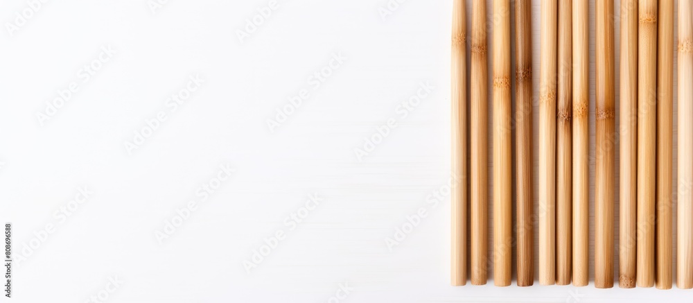 Copy space image of bamboo chopsticks on a white wooden background Copy space image of bamboo chopsticks on a white wooden background