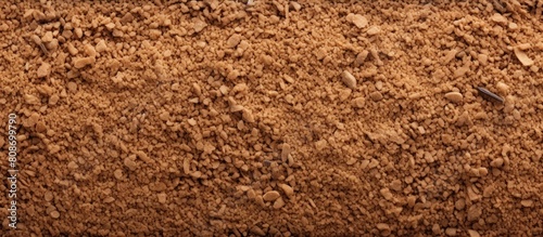 Close up copy space image of a textured brown beach sand perfect for background use
