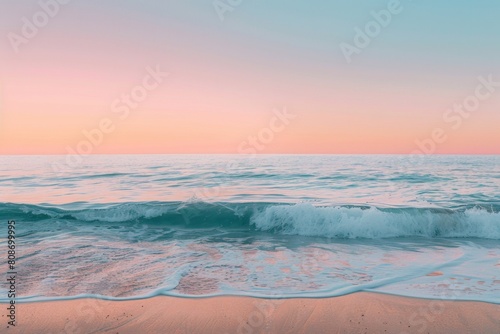 Pastel sunset over calm ocean waves