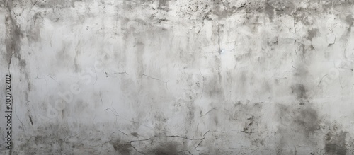 Abstract art pattern of a gray blank cement textured or plastered wall providing a creative background with copy space image on a construction site photo