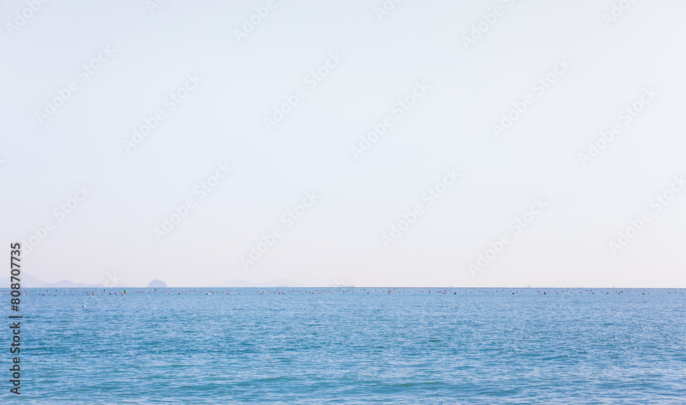 Sea landscape on a sunny day. water fog beyond the horizon