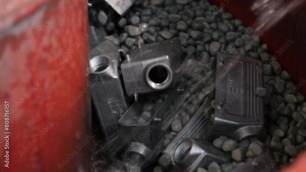 Pebble polishing machine. The parts produced in the factory become smooth on the pebble polishing machine. Pebble polishing machine. The parts produced in the factory become smooth on the pebble polishing machine.