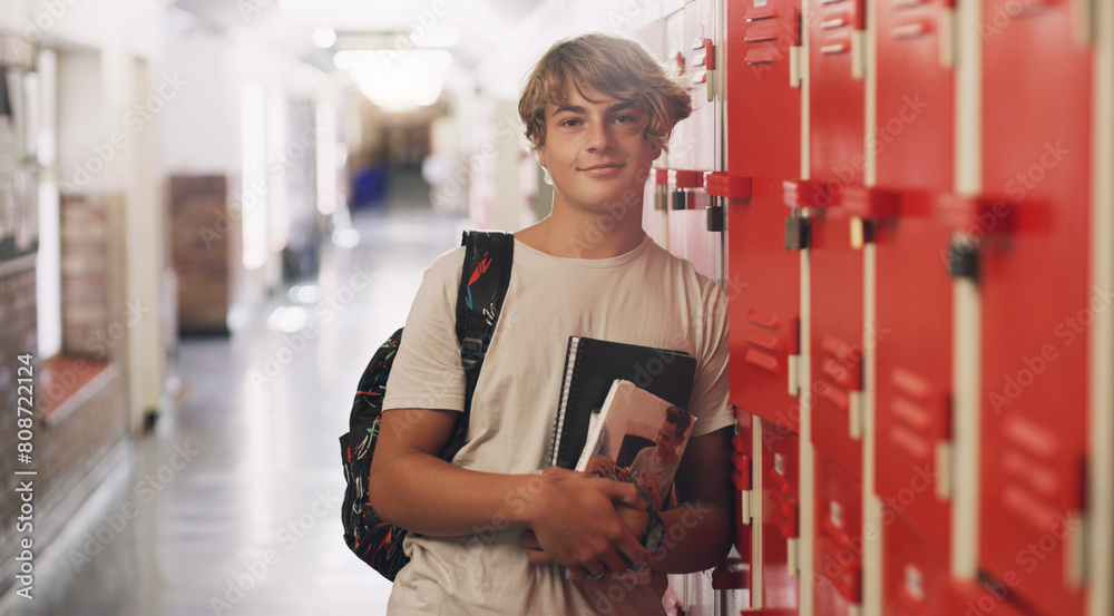 Εκτύπωση καμβά Boy, portrait and hallway as high school student by lockers with books for education, scholarship or campus