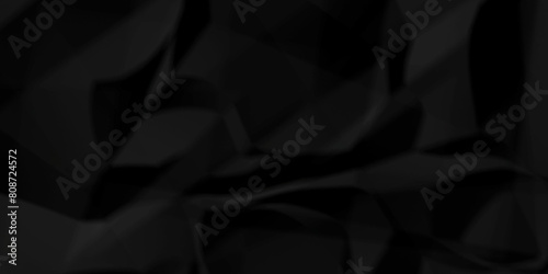 Dark black crumple paper wrinkled poster template ,blank glued creased paper texture background. black paper crumpled backdrop background. used for cardboard.	
