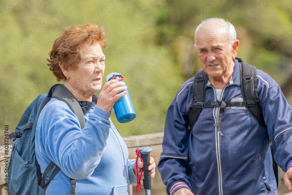 senior couple hiking outdoors in nature senior couple hiking outdoors in nature