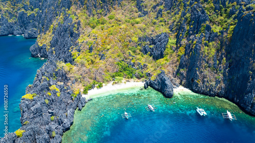 Aerial view of One of the best island and beach destination in the world, a stunning view of rocks formation and clear water of El Nido Palawan, Philippines.