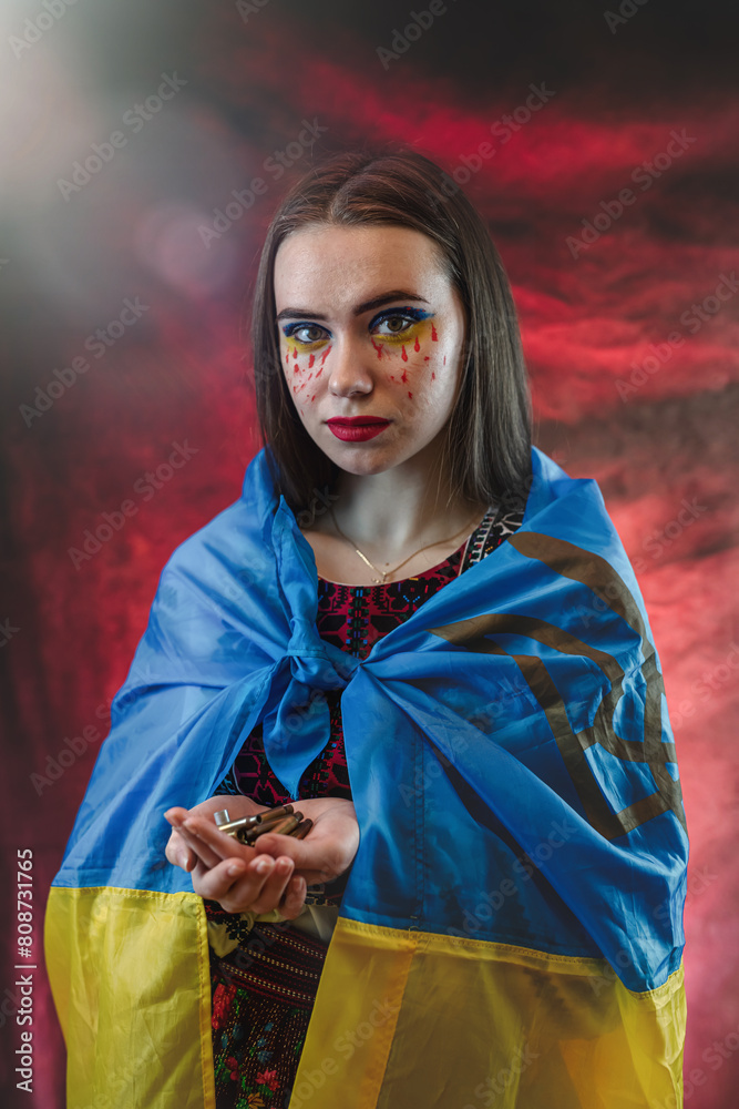 Φωτογραφία Portrait of sad Ukrainian woman wear national clothes with blue and yellow flag