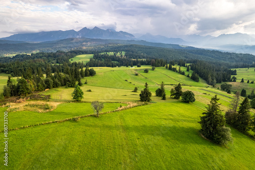 Countryside fields and scenic landscape in Podhale region of Poland. Aerial drone view. © marcin jucha