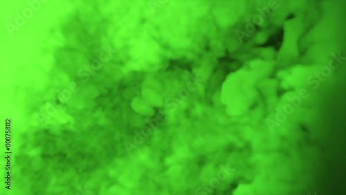 the bubbling of thick green smoke