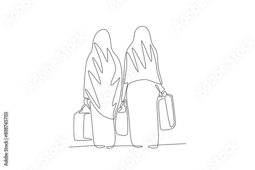 Two refugee mothers. World refugee day concept one-line drawing