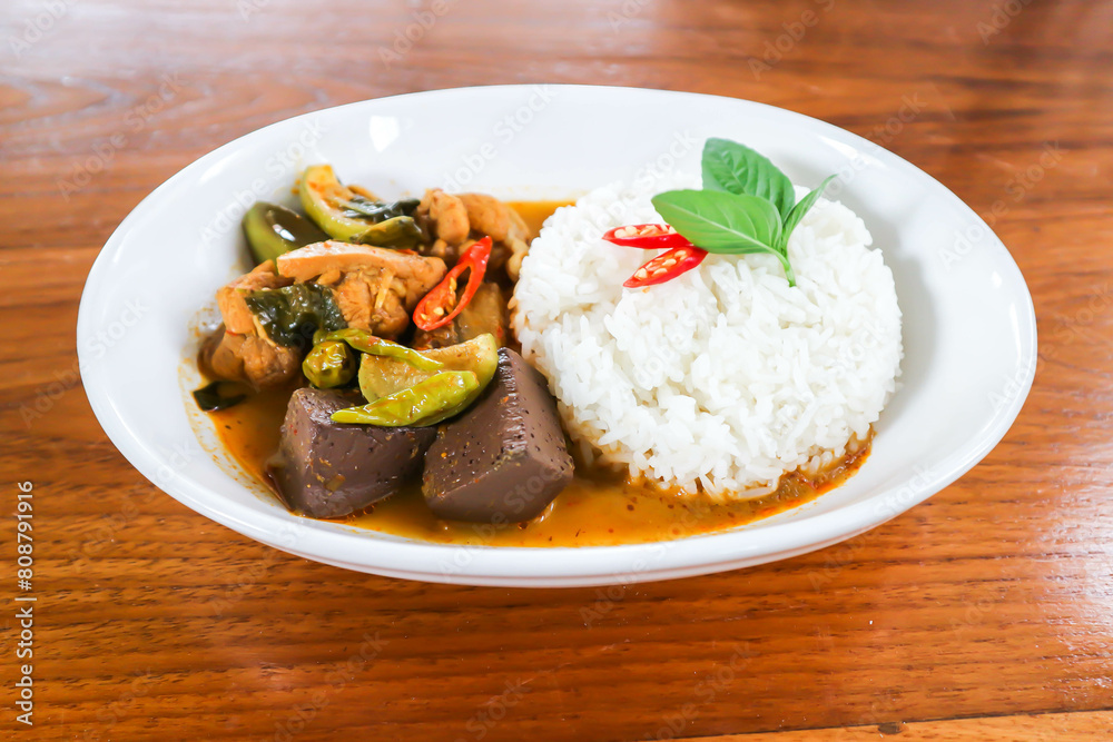 chicken curry , yellow curry chicken or chicken soup with rice chicken curry , yellow curry chicken or chicken soup with rice
