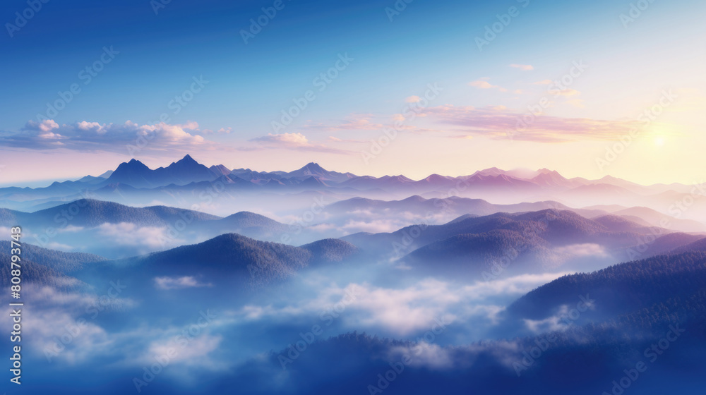 Breathtaking view of vibrant sunrise or sunset over rugged mountain peaks with clouds