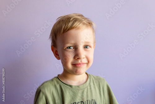 Portrait of happy joyful laughing beautiful little boy © яна винникова