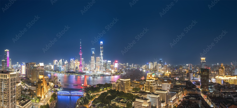 Obraz premium Dazzling Urban Skyline Panorama at Nighttime