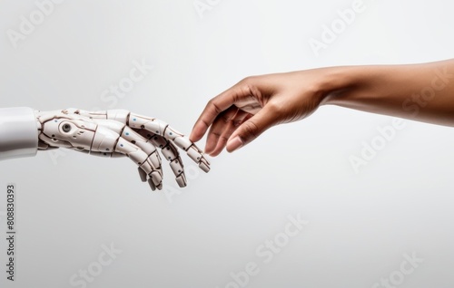 Robot and human hand. The connection between AI technology and man. Handshake © BonumArt