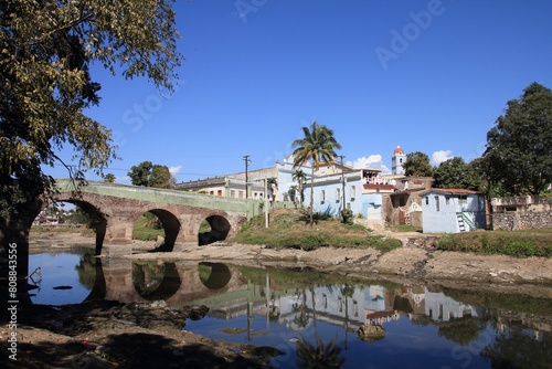 Sancti Spiritus, Cuba - townscape with River Yayabo bridge. photo