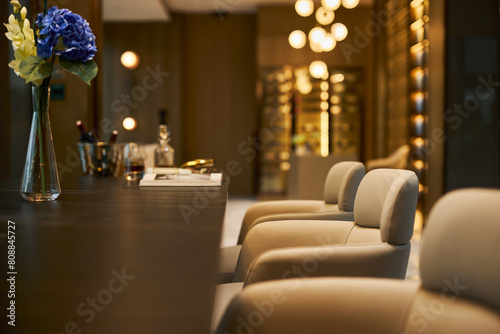 Elegant Lounge-A luxurious lounge with a magazine and wine on the table