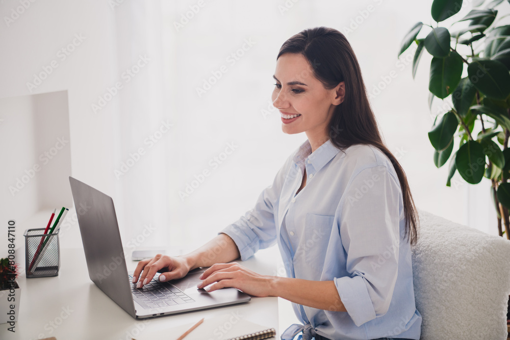 Portrait of pretty lady coworking chatting laptop desktop white interior home office indoors Portrait of pretty lady coworking chatting laptop desktop white interior home office indoors