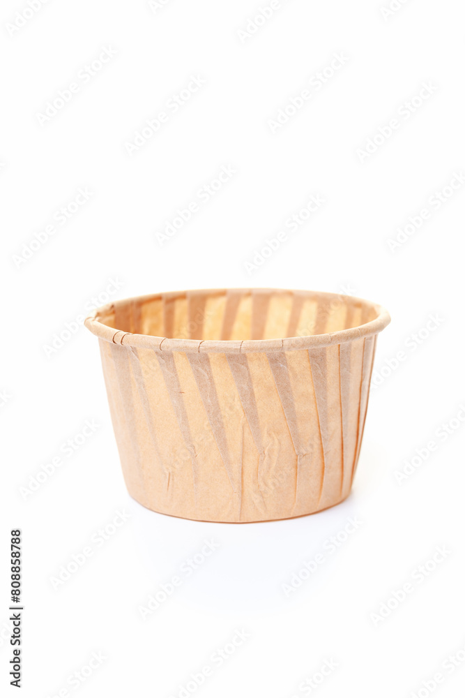 Empty paper baking cup for cupcake or muffin on white background Empty paper baking cup for cupcake or muffin on white background