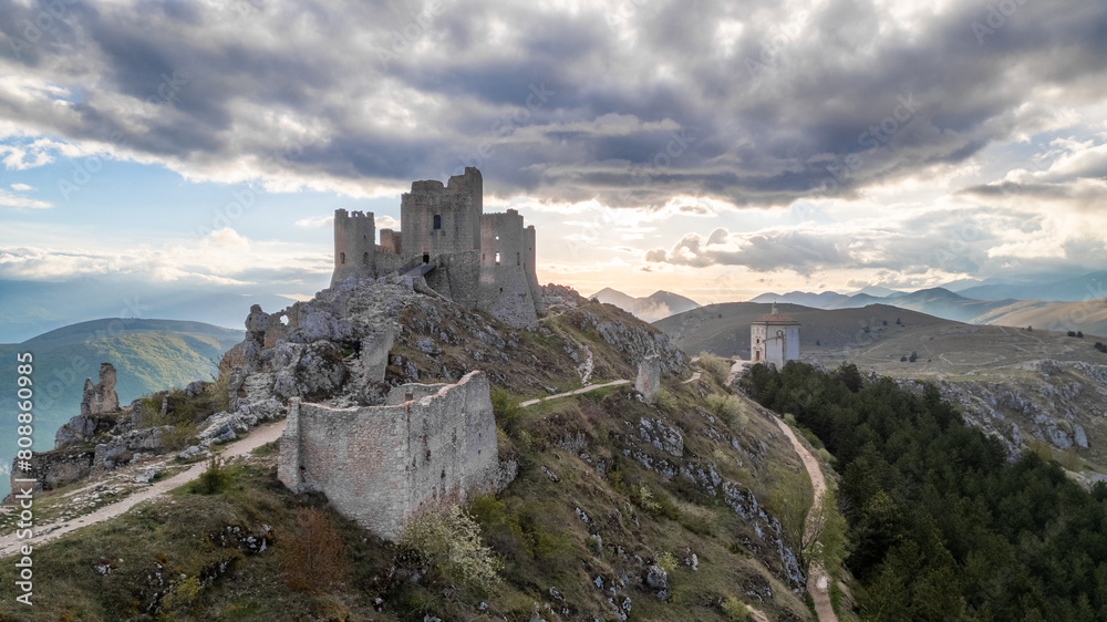 Rocca Calascio at sunset with cold light and threatening clouds