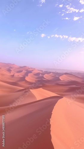 A desert landscape with a blue sky in the background