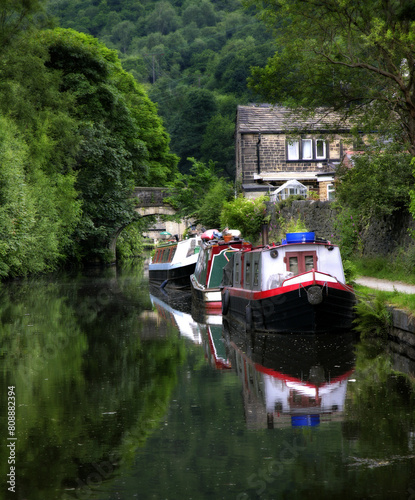Photography Boats in canal and old mill