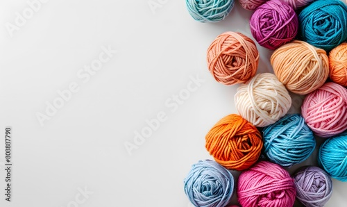 Needlework Warm colored cotton yarn balls on white table, Generative AI