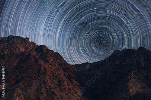 Star trails  over the mountains. Night landscape. 