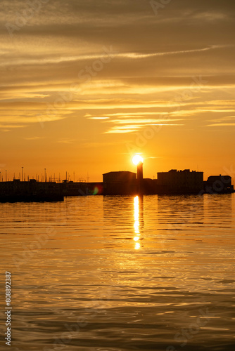 Tramonto sul mare visto dal molo Audace, città di Trieste, Friuli Venezia Giulia photo