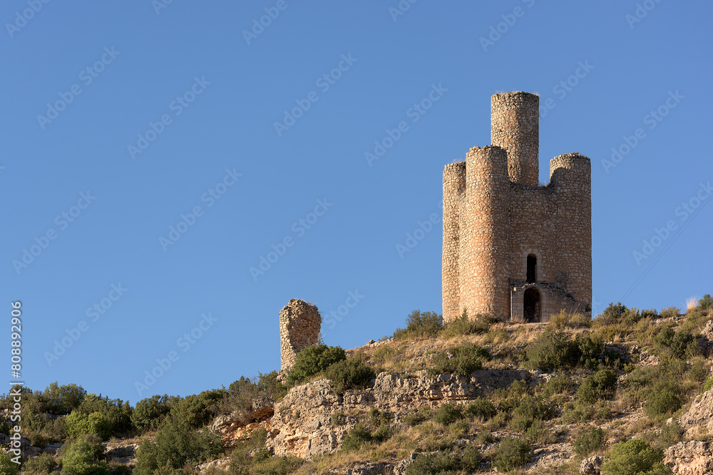 Torre de los Alarconcillos in Alarcon, Cuenca, against a clear blue sky