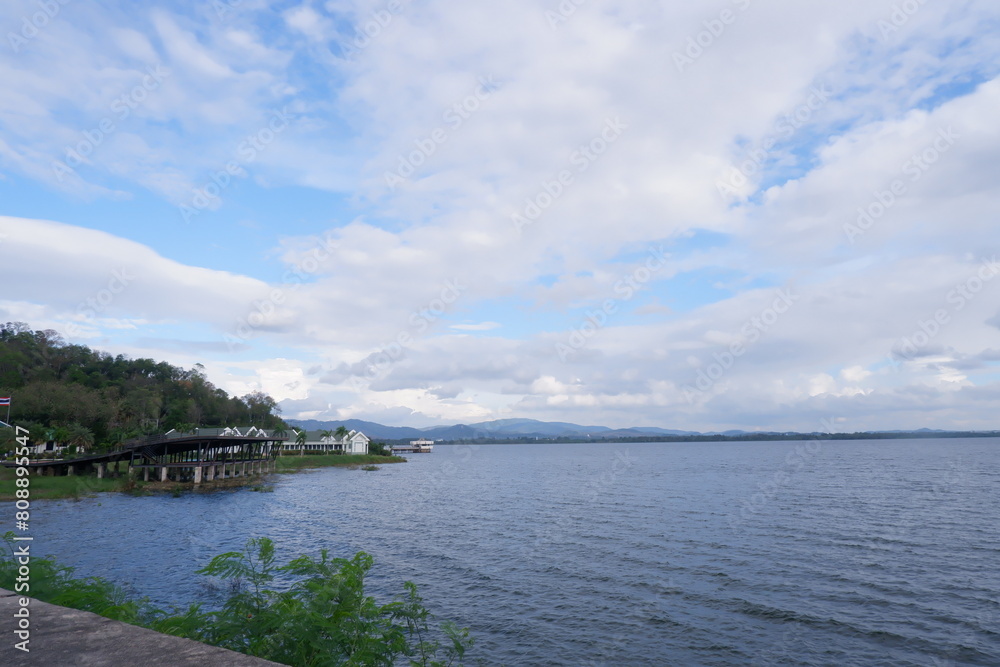 Wide view of Banhphra Lake with blue sky covered by white cloud
