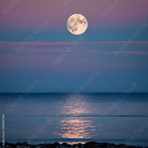 Twilight's Glow: Immersing in the Serenity of the Super Moonlit Evening Seascape © Parichart