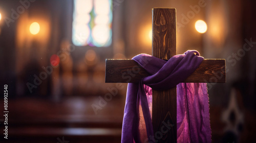 Wooden Cross Draped with a Purple Cloth in a Church, Symbolizing the Lent Season in Christian Faith