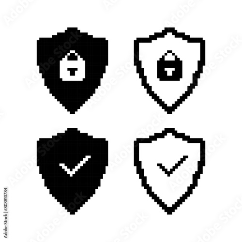 Shield pixel icon. Set of black and white shield icons. 8 bit shield sign. Arcade game symbol.