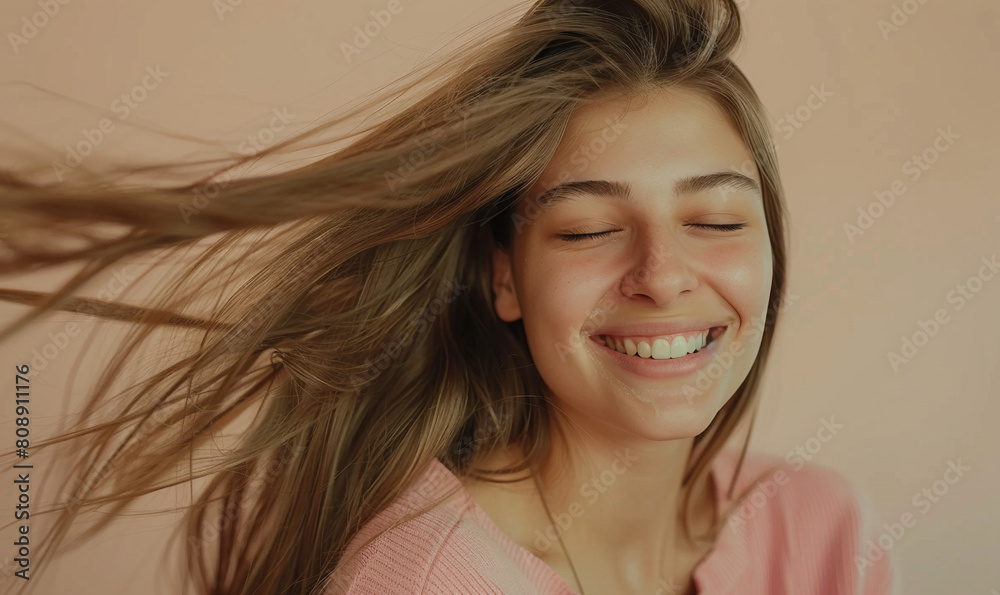 young woman smiles and enjoys her beauty, combes long straight hair after applying mask, stands young woman smiles and enjoys her beauty, combes long straight hair after applying mask, stands