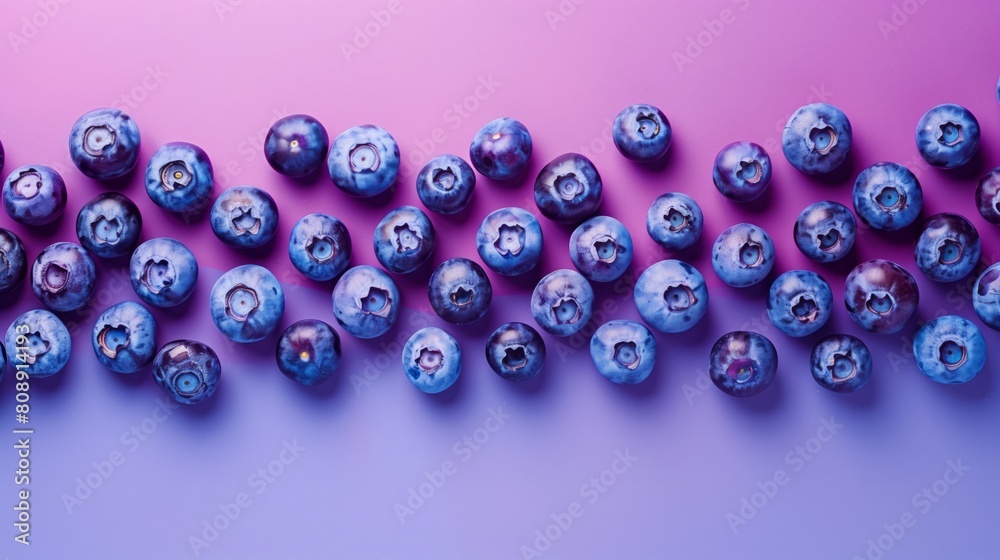 A cluster of ripe blueberries resting side by side, showcasing their vibrant hue and juicy freshness A cluster of ripe blueberries resting side by side, showcasing their vibrant hue and juicy freshness