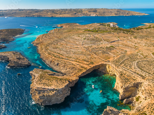 Aerial view of Crystal lagoon on Comino island. Boats. Mediterranean sea, Malta